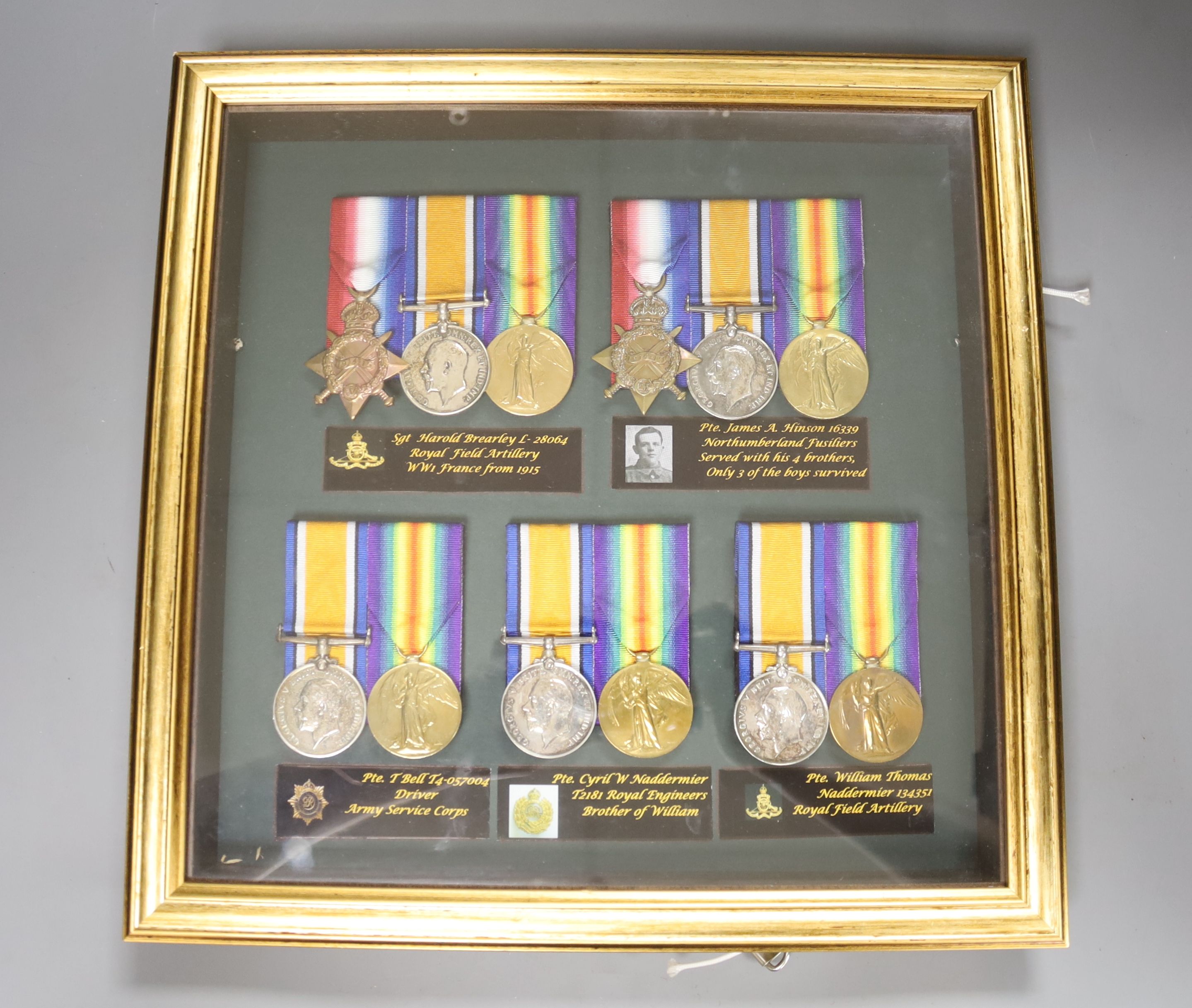 Five WW1 medal groups in one frame.